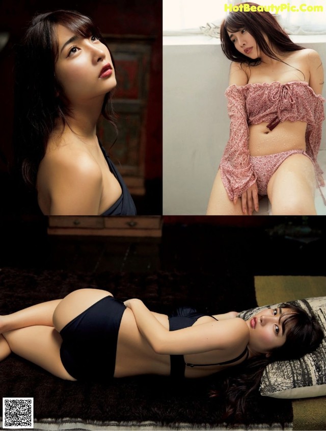 A woman laying on top of a bed next to a window.